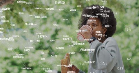 Dynamic business data overlaying woman drinking coffee outdoors