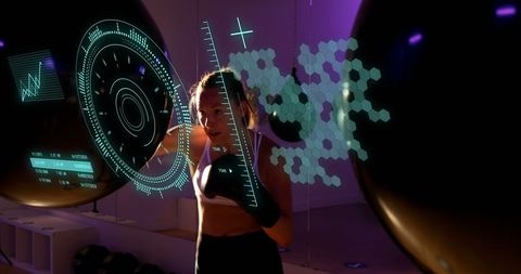 Futuristic Workout: Female Boxer Engages with Digital Interface - Download Free Stock Images Pikwizard.com