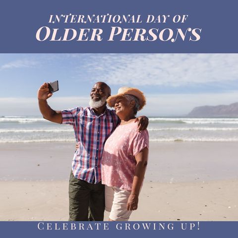 Senior Couple Taking Selfie on Beach Celebrating International Day of Older Persons