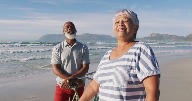 Senior Couple Enjoying the Beach and Sunny Weather - Download Free Stock Images Pikwizard.com