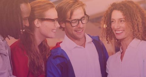 Diverse Friends Engaging with Technology in Casual Setting