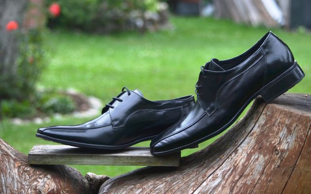 Elegant Black Leather Dress Shoes Displayed Outdoors - Download Free Stock Photos Pikwizard.com