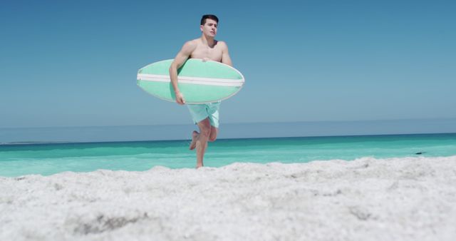 Young Man Ready for Surfing with Surfboard on Tropical Beach - Download Free Stock Images Pikwizard.com