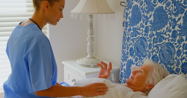 Nurse Caring for Senior Woman in Bright Bedroom - Download Free Stock Images Pikwizard.com