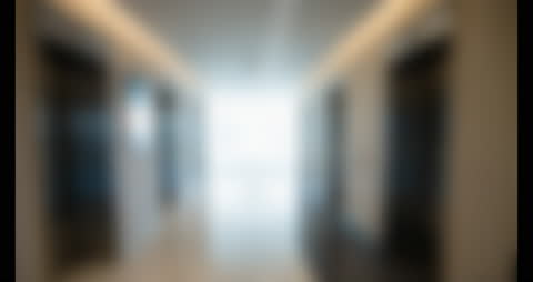 Scientist Viewing Glowing Hexagon in Futuristic Setting