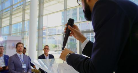 Business Speaker Presenting at Seminar Conference