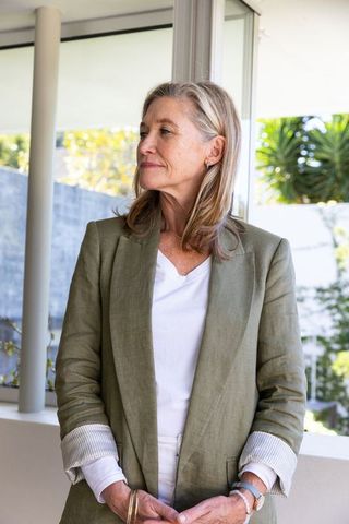 Elegant Senior Woman on Patio in Natural Light