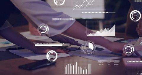 Business Team Leaning and Pointing at Charts with Futuristic HUD Overlay for Data