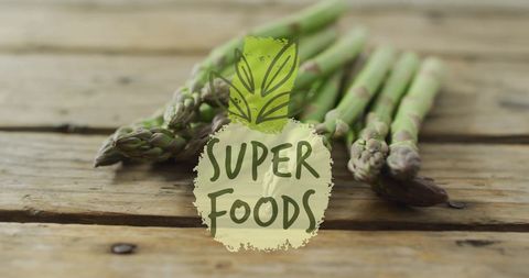 Green Asparagus Stalks on Rustic Wooden Table