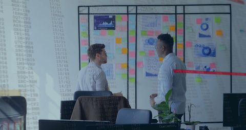 Team collaboration on financial data development in modern office