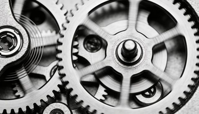 Macro closeup showing watch gears, clockwork and hairspring for precision engineering