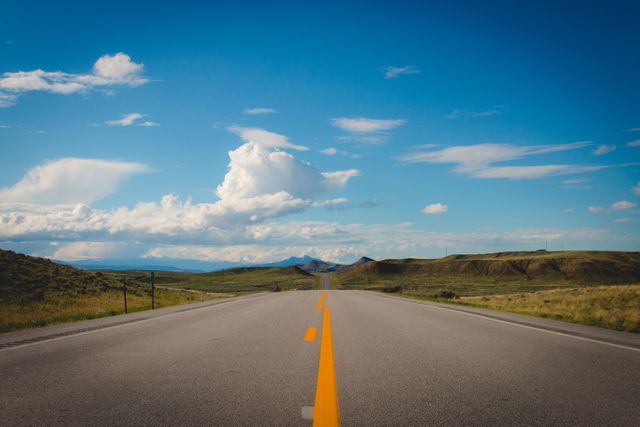 Open Road with Clear Blue Sky and Scenic Landscape - Download Free Stock Photos Pikwizard.com