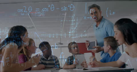 Diverse Classroom with Teacher Explaining Math Formulas on Laptop