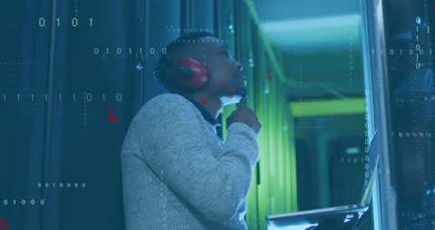 Technician Analyzing Server Room Data Center Operations