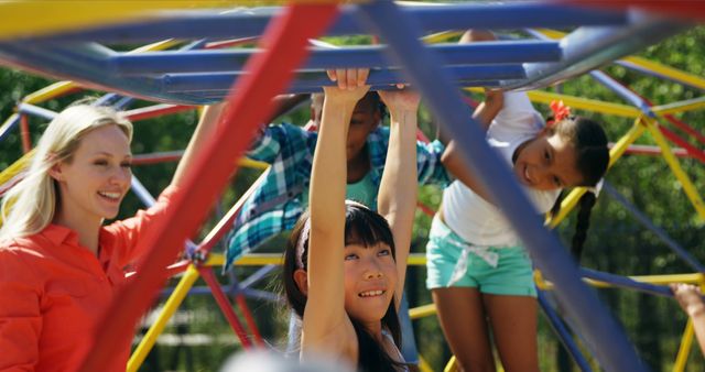 Children Playing on Playground Climbing Structure with Teacher Supervision - Download Free Stock Images Pikwizard.com