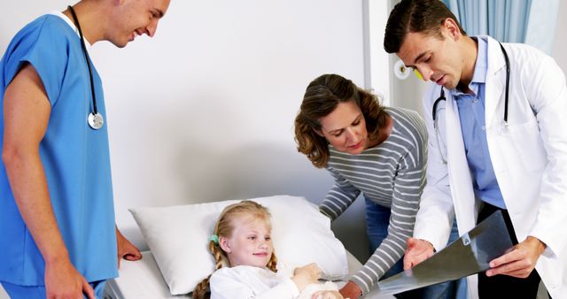 Group of Healthcare Professionals Assisting Child Patient - Download Free Stock Images Pikwizard.com