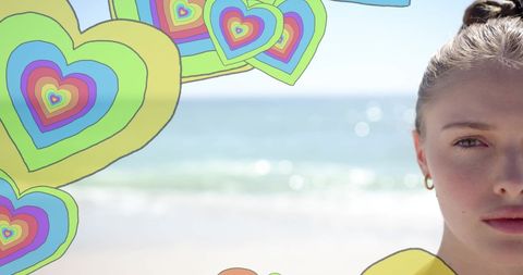 Playful Hearts and Young Woman at Sunny Beach