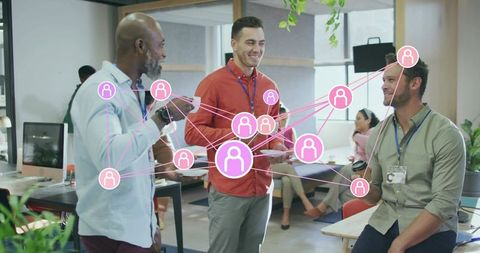 Diverse Colleagues Engaging in Modern Office Connectivity