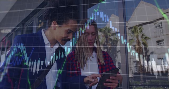 Business Professionals Analyzing Stock Market Data on a Digital Tablet Outdoors - Download Free Stock Images Pikwizard.com