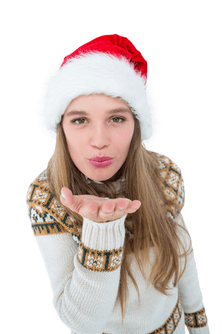 Cheerful Woman in Santa Hat Blowing Kiss on Transparent Background