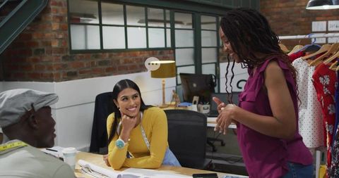 Diverse team of fashion designers in creative collaboration