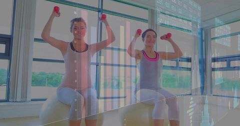 Women Exercising on Stability Balls with Dumbbells and Digital Fitness Data Overlays