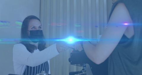 Masked Barista Serving Customer in Cafe with Lens Flare Effect