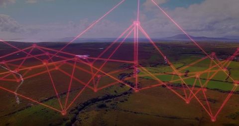 Neon network mesh connecting rural farmland from aerial perspective over rolling hills