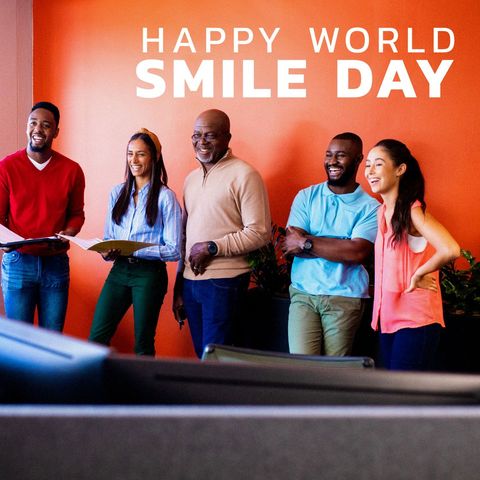 Diverse group celebrating world smile day with joyful laughter