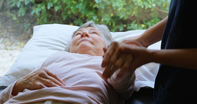 Caring Nursing Assistance for Elderly Woman in Bed - Download Free Stock Images Pikwizard.com