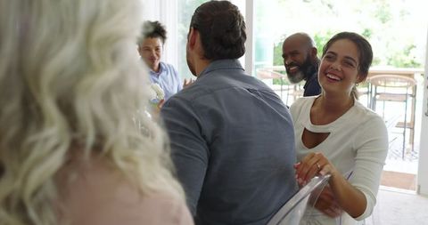 Guests enjoying lively wedding reception ambiance