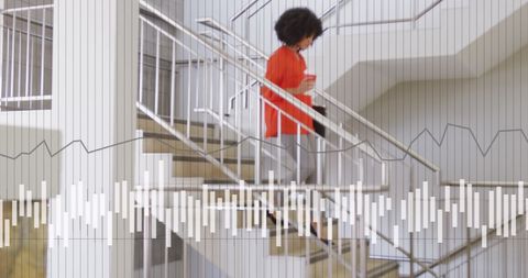 Businesswoman in Office with Data Analysis Overlay