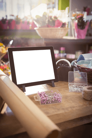 transparent tablet display in flower shop for point of sale - Download Free Stock Videos Pikwizard.com