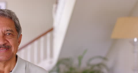 Happy Senior Man Relaxing at Home with Copy Space