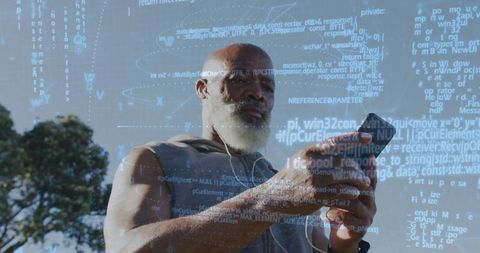Senior man using smartphone with holographic code overlay during outdoor workout
