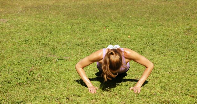 Woman Exercising with Push-Ups in Green Park - Download Free Stock Images Pikwizard.com