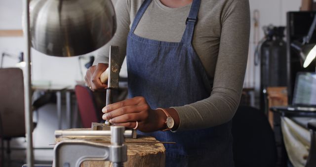 Craftsperson Working in Workshop Using Hammer and Chisel - Download Free Stock Images Pikwizard.com