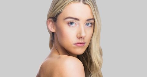 Portrait of woman with long blonde hair and natural makeup - Download Free Stock Images Pikwizard.com