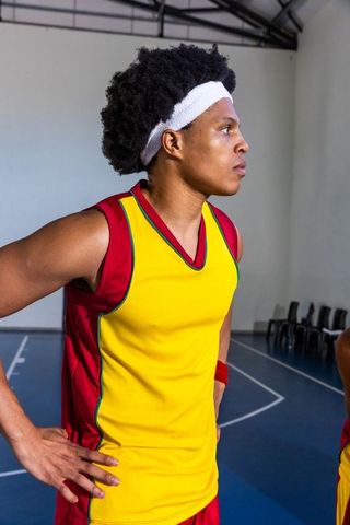 Confident Athlete Focused on Basketball Game Strategy