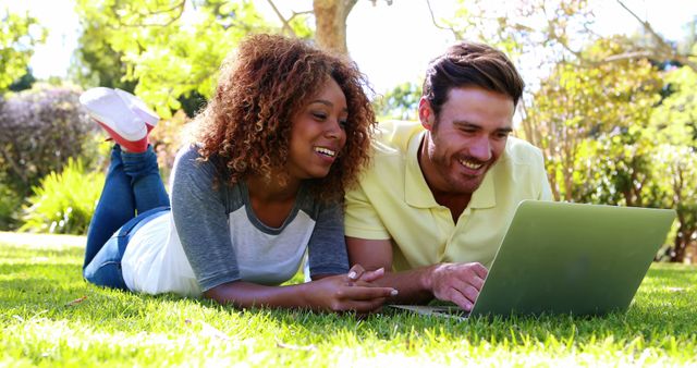 Happy Multi-Ethnic Couple Using Laptop Outside - Download Free Stock Images Pikwizard.com