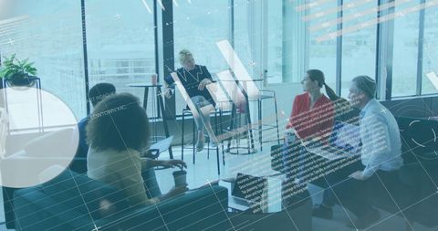 Diverse Team with Overlays of Financial Data in Modern Office