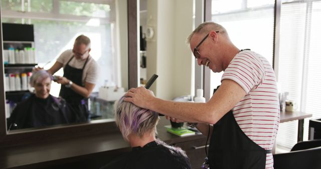 Professional Male Hairdresser Cutting Senior Woman's Hair - Download Free Stock Images Pikwizard.com