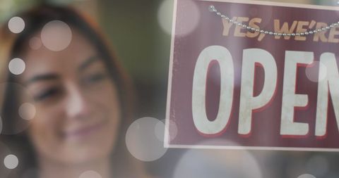 Female Shop Owner Focused on Business Opening