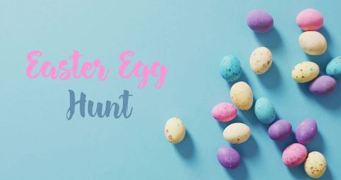Colorful Easter Egg Hunt and Greetings on Blue Background - Download Free Stock Images Pikwizard.com