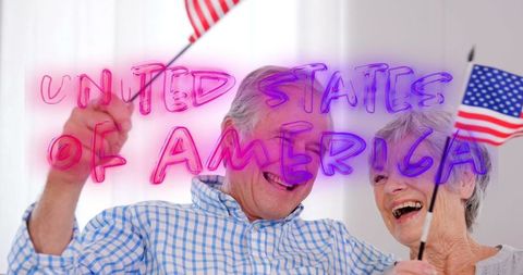 Joyful Elderly Couple Celebrating USA with Flags