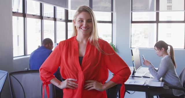 Confident Businesswoman Standing in Modern Office Workspace - Download Free Stock Images Pikwizard.com