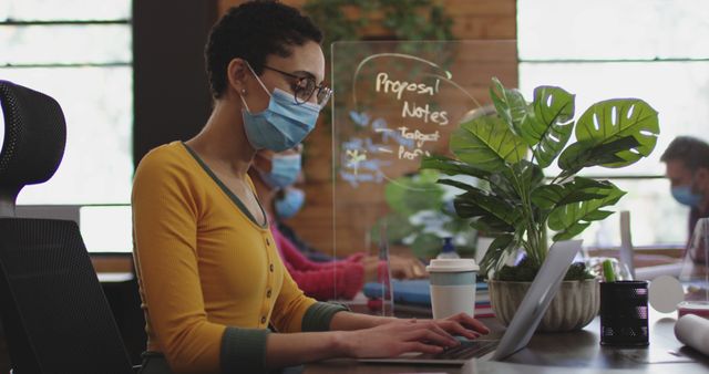 Employees in Masks Working at Office with Safety Precautions - Download Free Stock Images Pikwizard.com