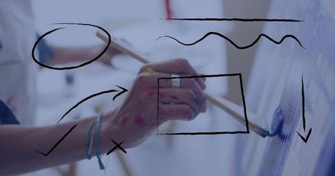 Artist engaging in creative abstract painting process