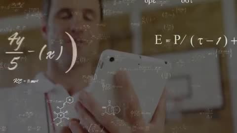 Sports Coach Analyzing Data with Formulas in Gym