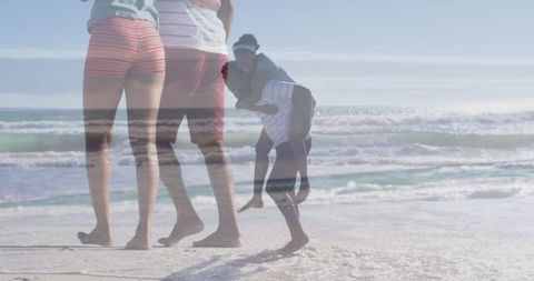 Family Bonding at the Beach on a Sunny Day